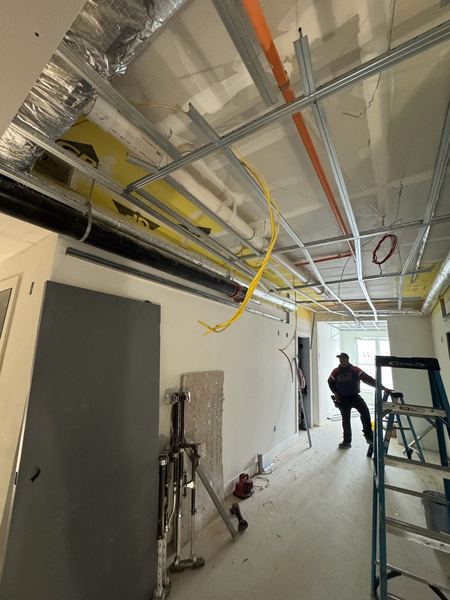 Light gauge metal frame ceiling in a unit
