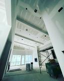 Taped high ceiling with exposed beams
