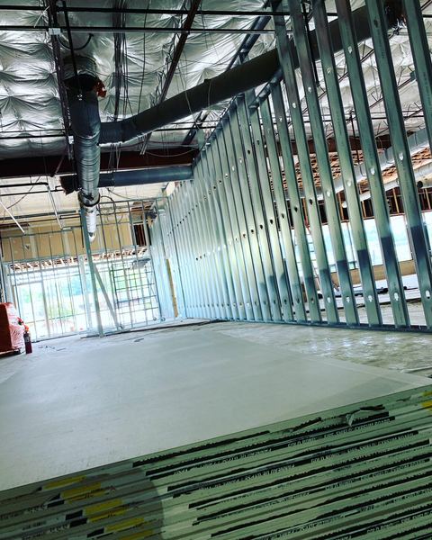 Light gauge metal frame walls with a stack of fire-rated board